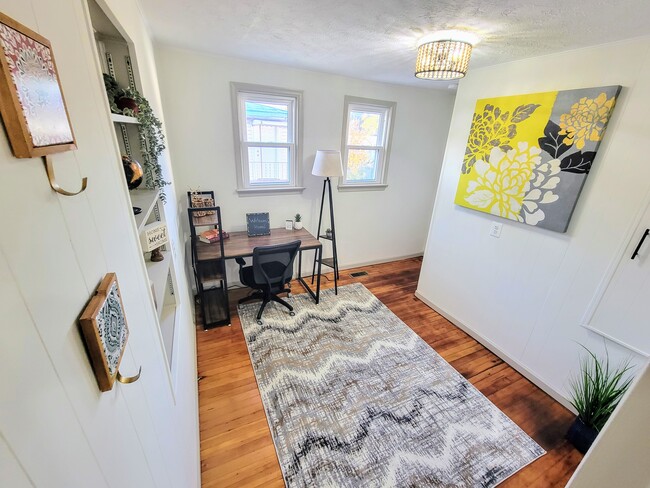 Den/office next to kitchen and leads to basement door - 112 Anderson Ave