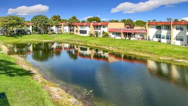 Building Photo - Desirable 55 plus community condo unit with a view of the lake on the 2nd Floor.