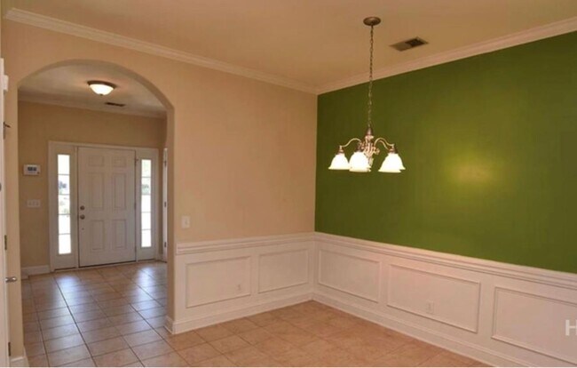 Building Photo - Townhome fresh paint and new carpet! Won't...