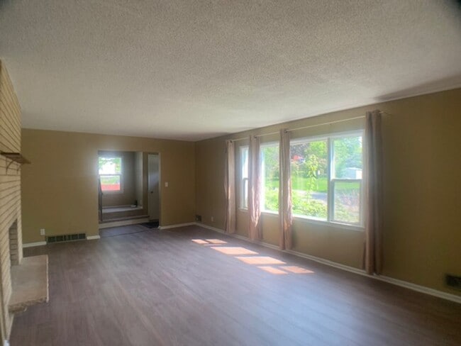 Building Photo - Huge yard! Updated appliances and more!
