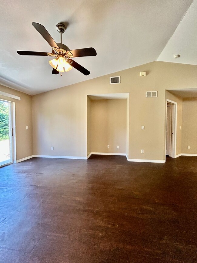 Building Photo - Charming 3BR/2BA Lehigh Acres Duplex with 1-Car Garage | Lawn Care & Salt Service Included