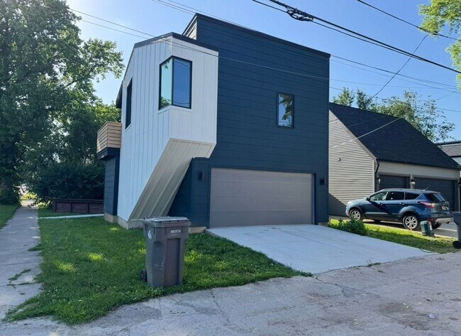 Building Photo - Vaulted Ceilings & Hardwood Floors in This Charming Indianapolis L