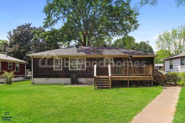 Building Photo - Updated Bungalow with Massive Deck and Fully Fenced Yard!