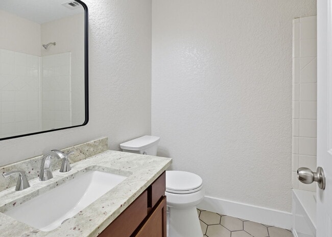 Building Photo - Discover the perfect blend of comfort and space at 6323 Myrtle.