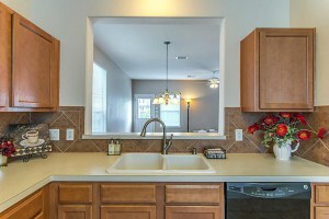 Either Both Formals(or one large Formal Dining); Great Kitchen with Corian counter tops, and Breakfast bar overlooking Large Breakfast Room Dimensions: 6x13 - 23609 Youpon Lake Lane