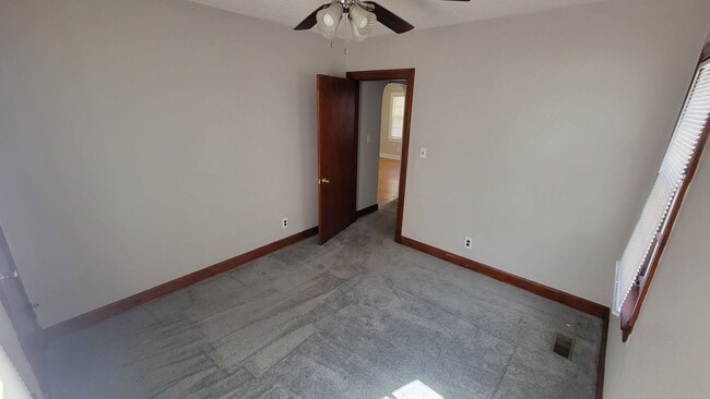 Building Photo - Two Bedroom Home with Fenced In Backyard