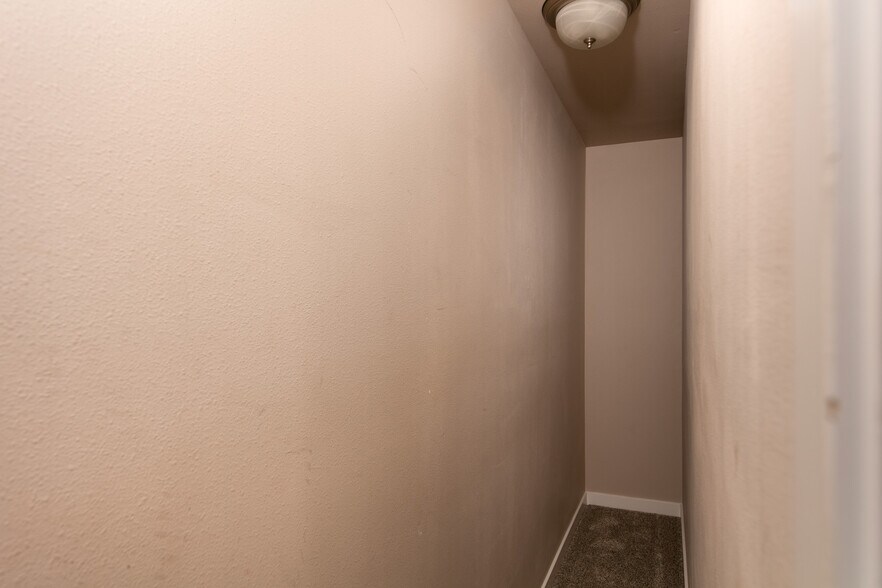 long closet that separates wall from neighbor - 1295 Windsong Dr