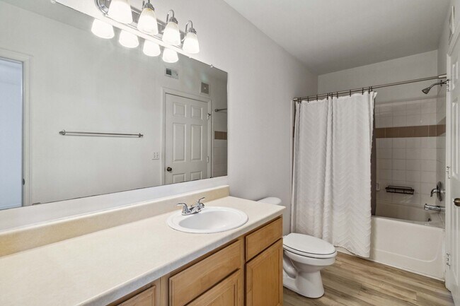 Building Photo - Spacious 1-Bedroom Condo for Annual Rent available now in gated Villagio Community