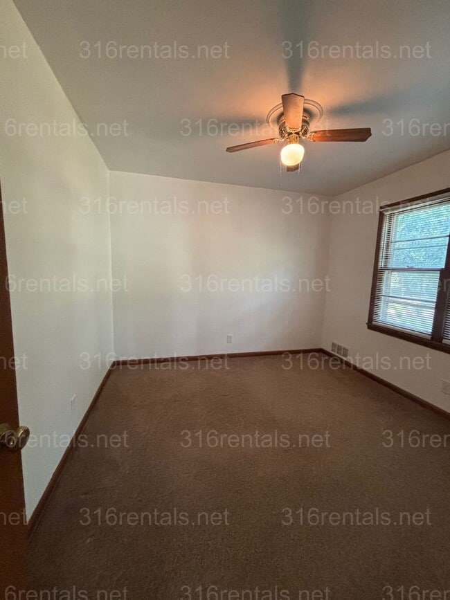 Building Photo - Three bedroom one bath house available now!