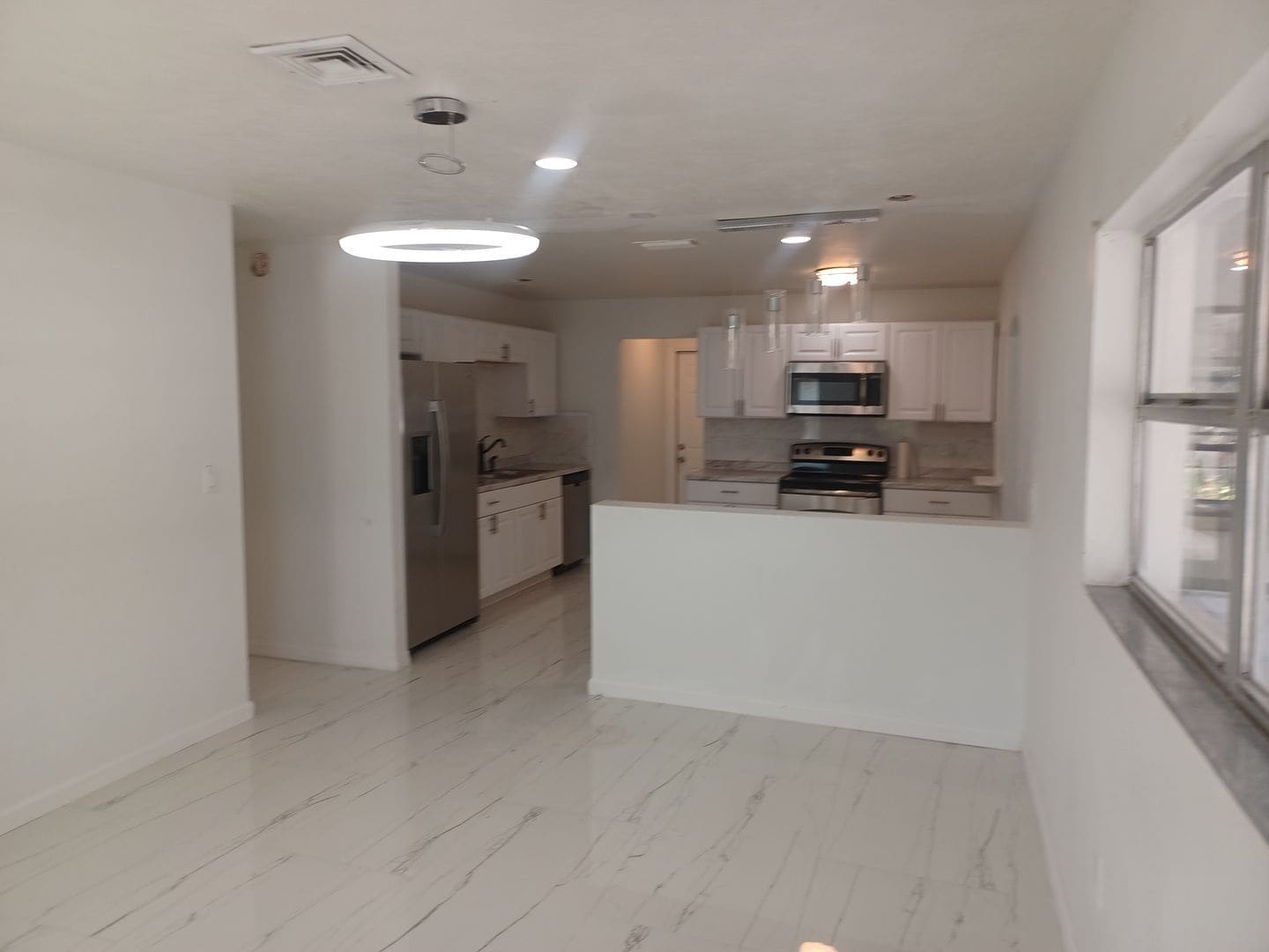 Building Photo - PRICE REDUCED! Newly Remodeled Stunning 4 bedroom / 2 bathroom home with a shed for extra storage...