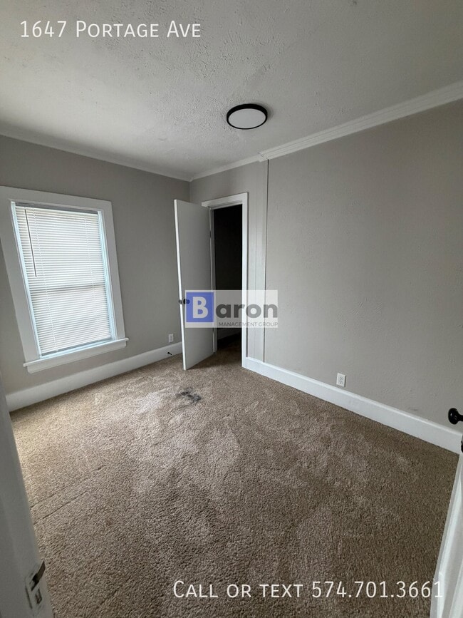 Building Photo - 1647 Portage Ave