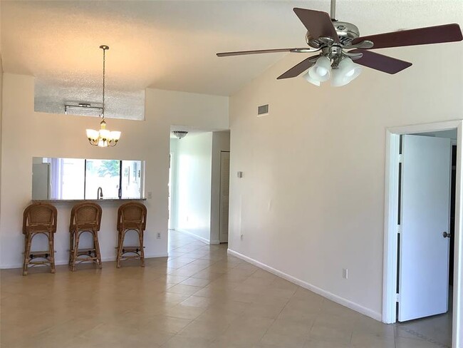 Building Photo - 10128 Boca Bend E
