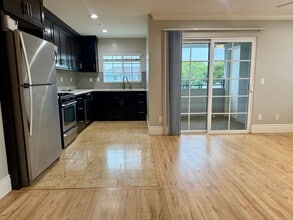 Building Photo - MOVE IN READY 2/2 with 2 Assigned Parking!...