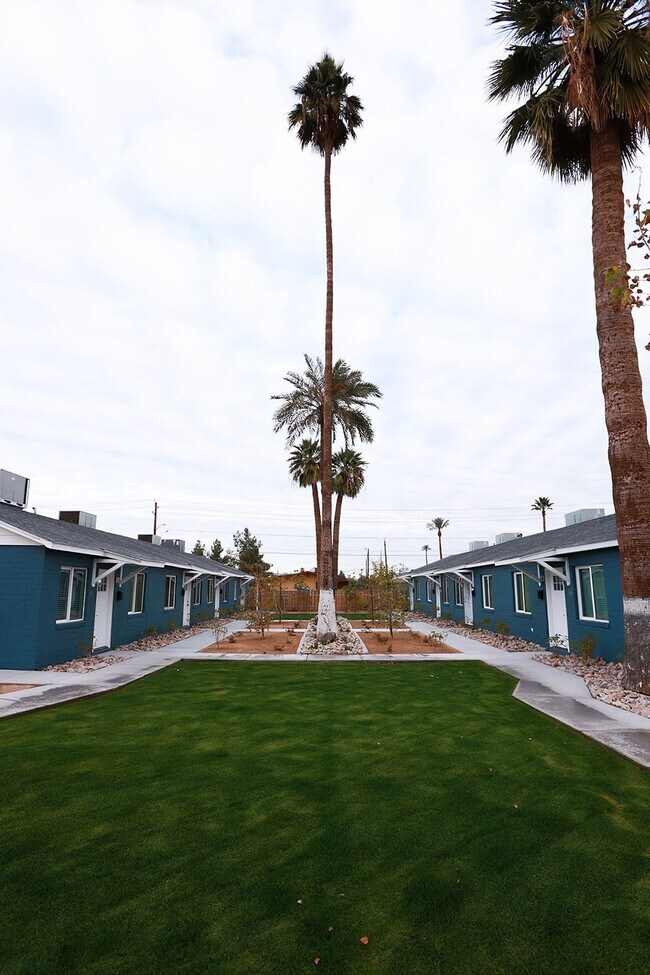 Building Photo - Boutique Living Meets Private Backyards an...