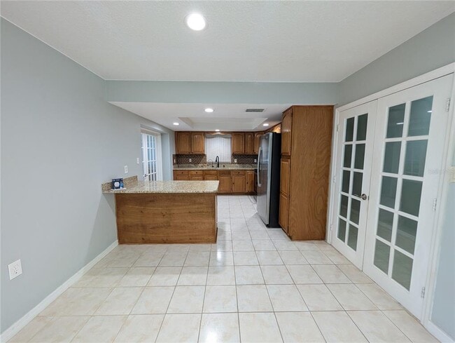 Building Photo - 6947 Bottle Brush Dr