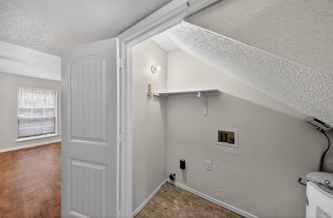 Building Photo - 2-Bed, 1.5-Bath, Two-Level Condo Delivers