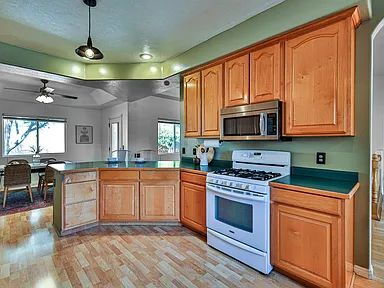 Building Photo - "Charming 4-Bed Oasis with Elegant Hardwoo...