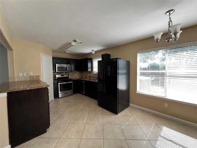 Building Photo - 8411 Tamayo Dr
