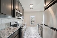 Building Photo - 1437 S Peoria Ave