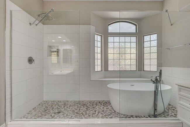 Building Photo - 4 bedroom, 3-bath home with a Pool!