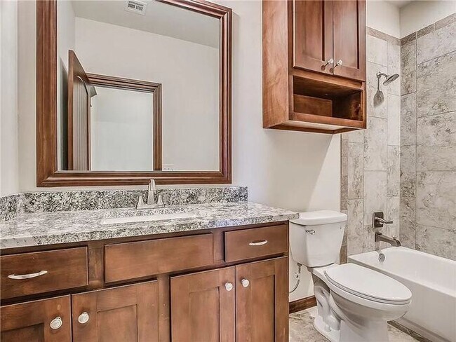 Building Photo - Fantastic 3/2 Gated Neighborhood Choctaw S...