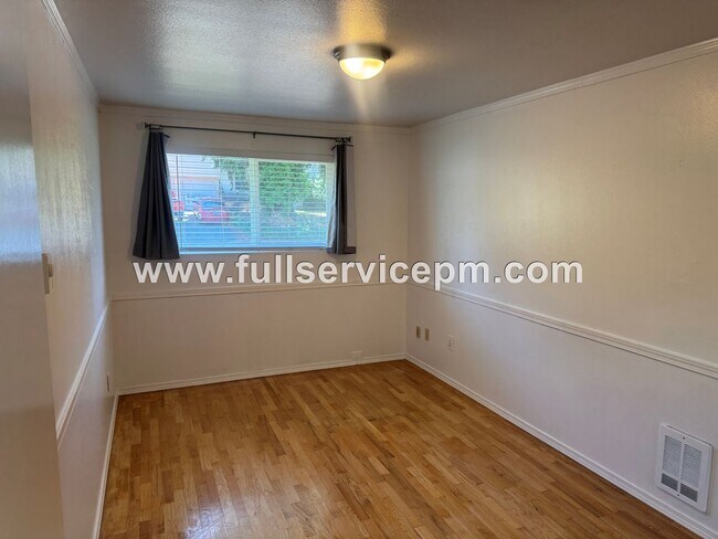 Building Photo - Spacious 4-Bedroom Upper-Level Home with Fireplace, Bonus Room & Large Deck