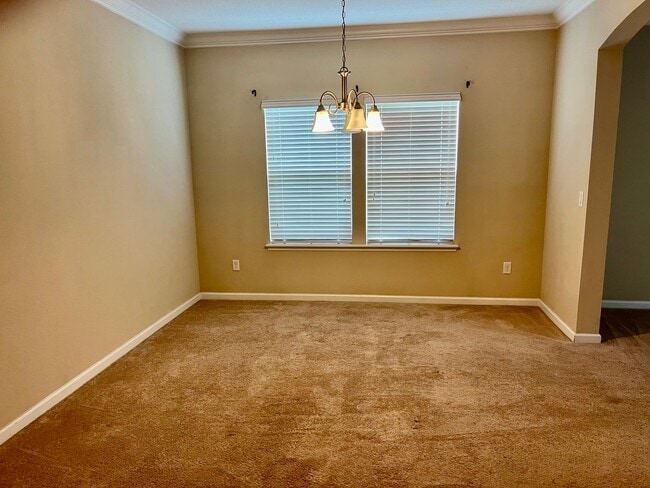 Building Photo - Spacious 5-Bedroom Home with Lawn Care Included!