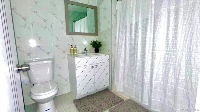 Building Photo - 70-25 Queens Blvd