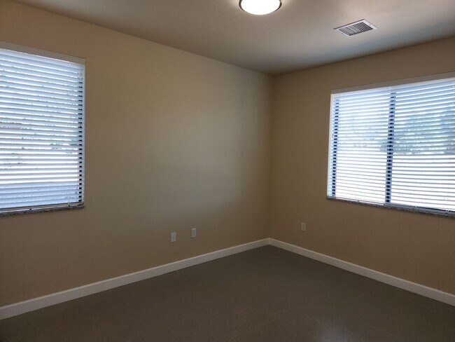 Building Photo - NEW Bison Cove E4 End Unit Now Available