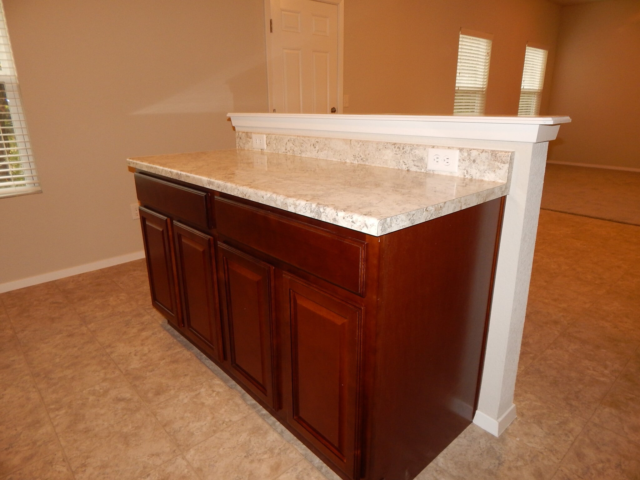 Kitchen island adds counter space and cabinet storage, too. - 5074 W Claxton Circle
