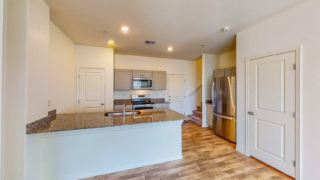 Building Photo - Cozy 2-story, 3BR 2BA townhome in a new community in North Las Vegas.