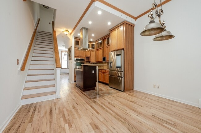 Dining room into kitchen - 130 W 132nd St