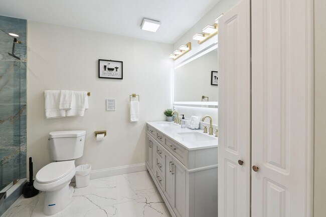 Building Photo - Fully Furnished: Beautiful 4-Bedroom Home ...