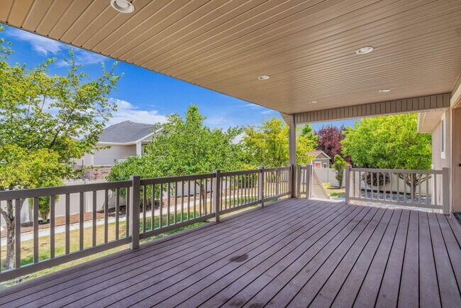 Building Photo - Spacious Syracuse Home with Covered Deck, Loft & Oversized 3-Car Garage