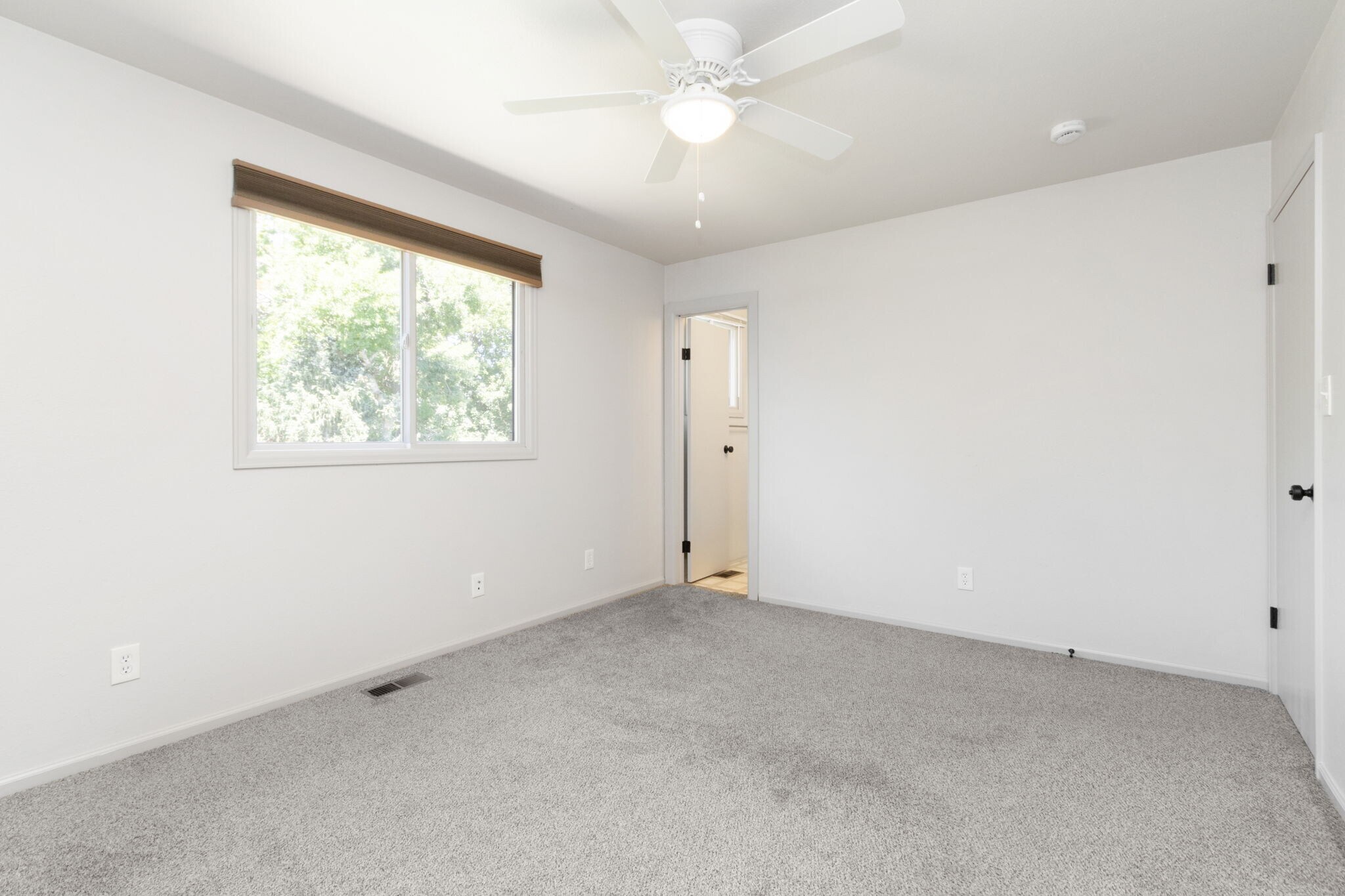 Primary bedroom with private bathroom. - 1956 Promenade Way