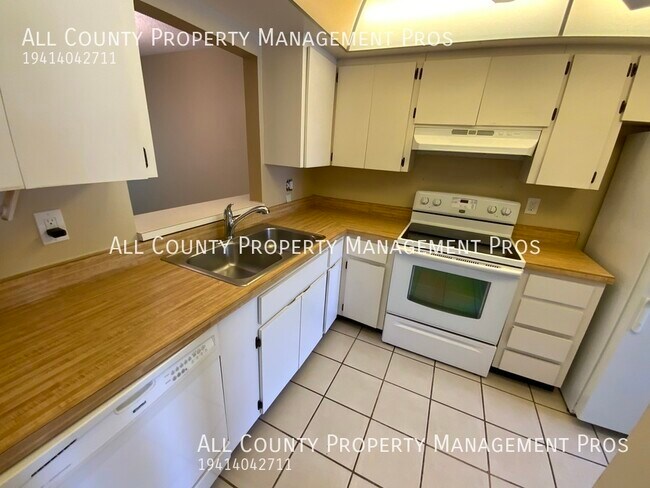 Building Photo - 7060 W Country Club Dr N