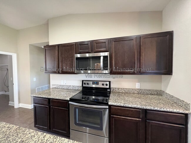 Building Photo - 7045 Harvest Way