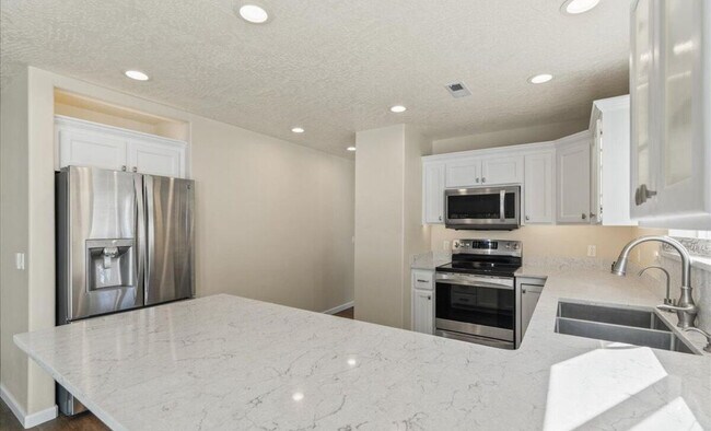 Building Photo - 4995 N Tasman Dr