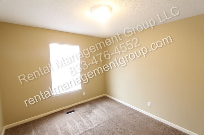 Building Photo - New On The Market! 3BR 2BA + Lower Level D...