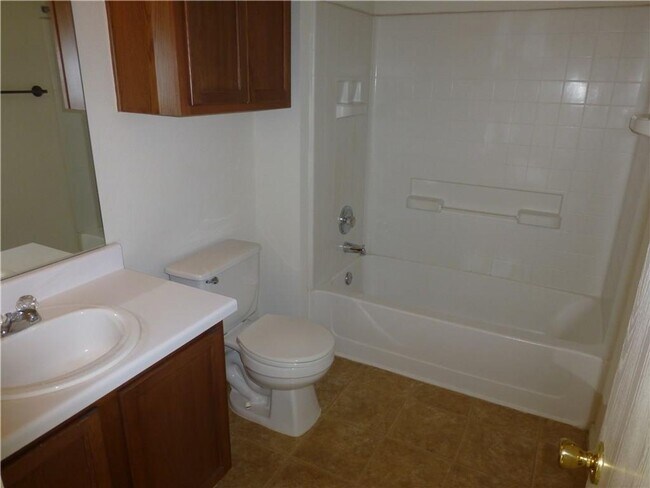 Building Photo - Generous Four Bedroom, Three Bath Home with Large Yard