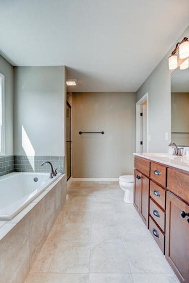 Building Photo - Beautiful 5 bed home with New Fence and Finished Basement -  Mahomet - AVAILABLE NOW