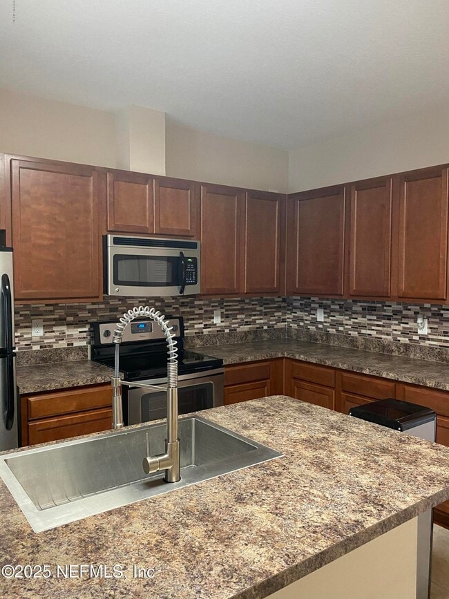 Building Photo - 4220 Plantation Oaks Blvd