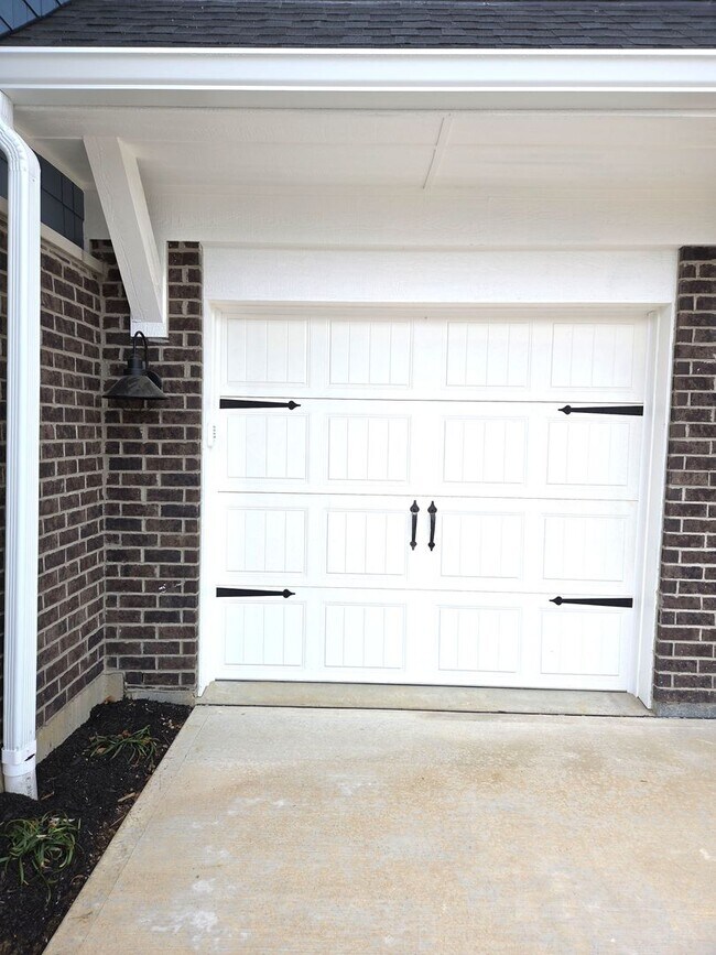 Building Photo - Exquisite just built condo with everything! Ground floor, no stairs, attached garage