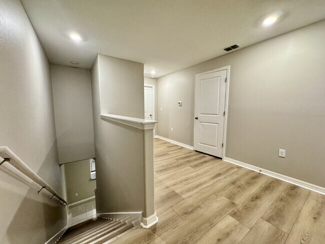 Building Photo - "Charming 3-Bed townhouse with Granite Accents, 2.5 Baths, 1650 Sq Ft – New Flooring and New Paint