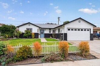 Building Photo - Beautiful 4 Bedroom Home with Smart Features, Entertainer’s Backyard & Attached Garage