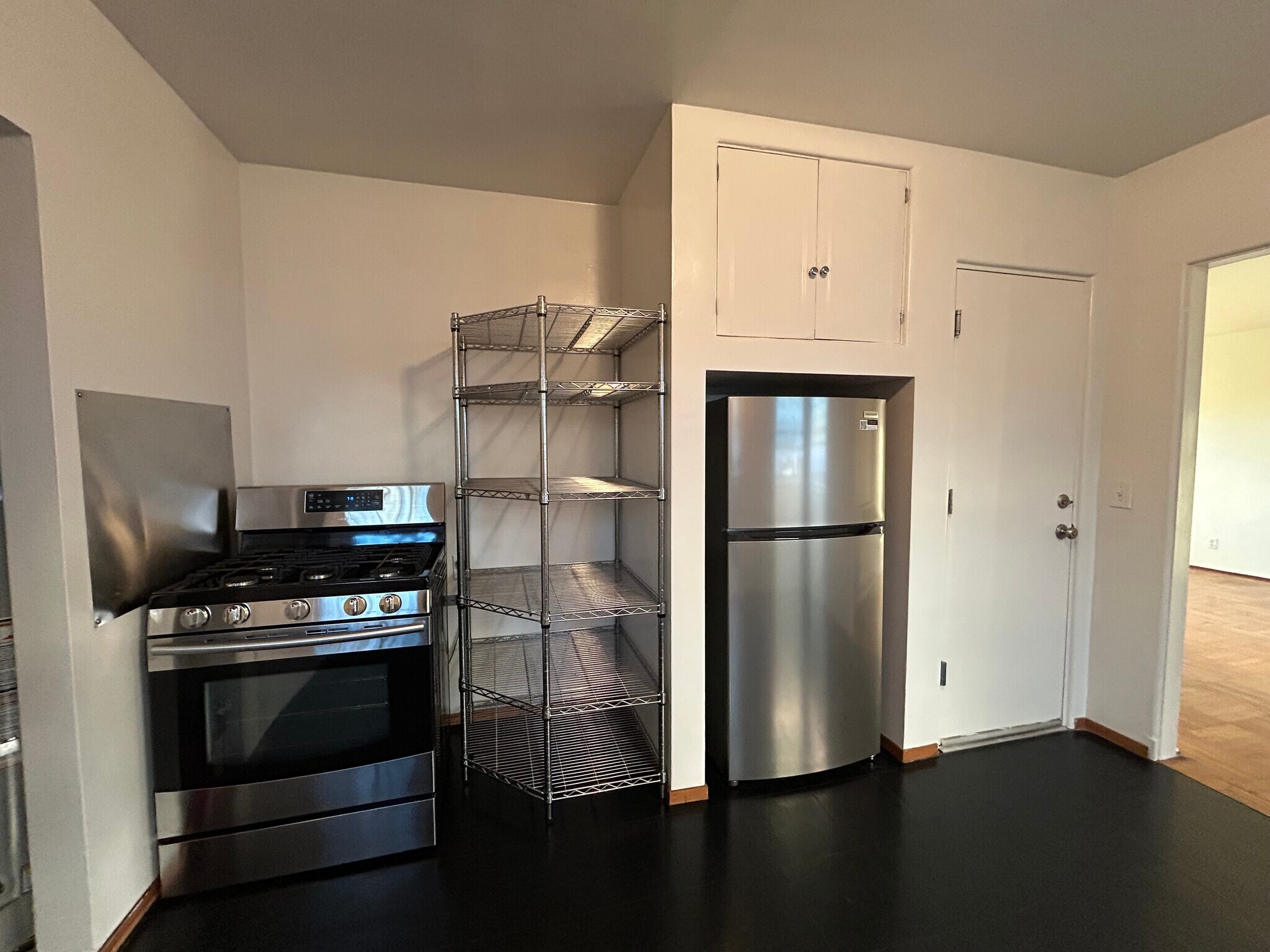 Kitchen, door on right leads to the garage. - 1903 Sacramento St
