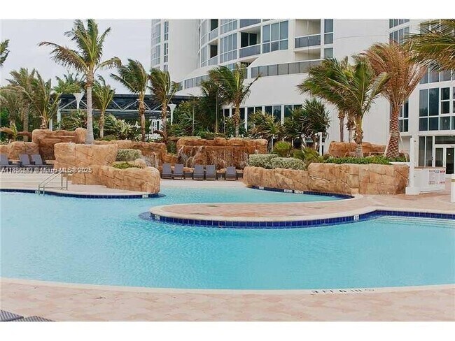 Building Photo - 18201 Collins Ave