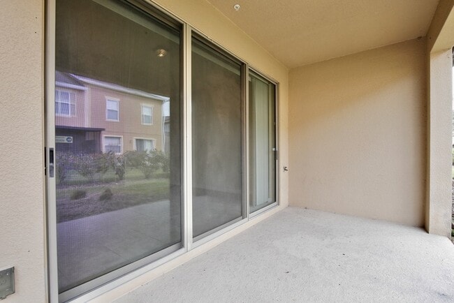 Building Photo - Beautiful 3/2.5 Spacious Townhome with 1 Car Garage in the Gated Community of Jackson Park - Orla...