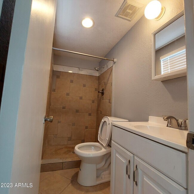 Building Photo - 1636 N 64th Dr