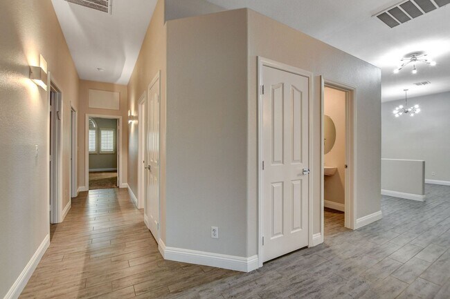 Building Photo - 4 bedroom, 3-bath home with a Pool!